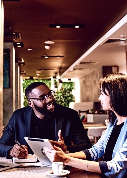 two people discussing Business Crypto Banking
